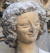 169px-Laughing_angel_Reims